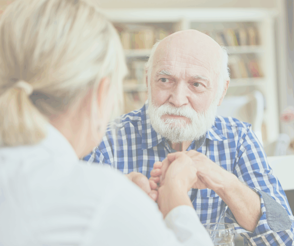 Caregiver helping senior with his dementia